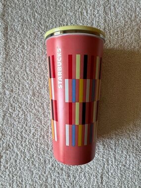 Starbucks Coral Tumbler with Yellow Lid and Multicolor Stripe Pattern